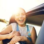 happy girl in car