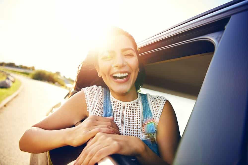 happy girl in car