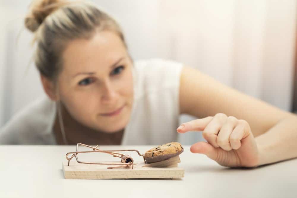 hungry woman with cookie